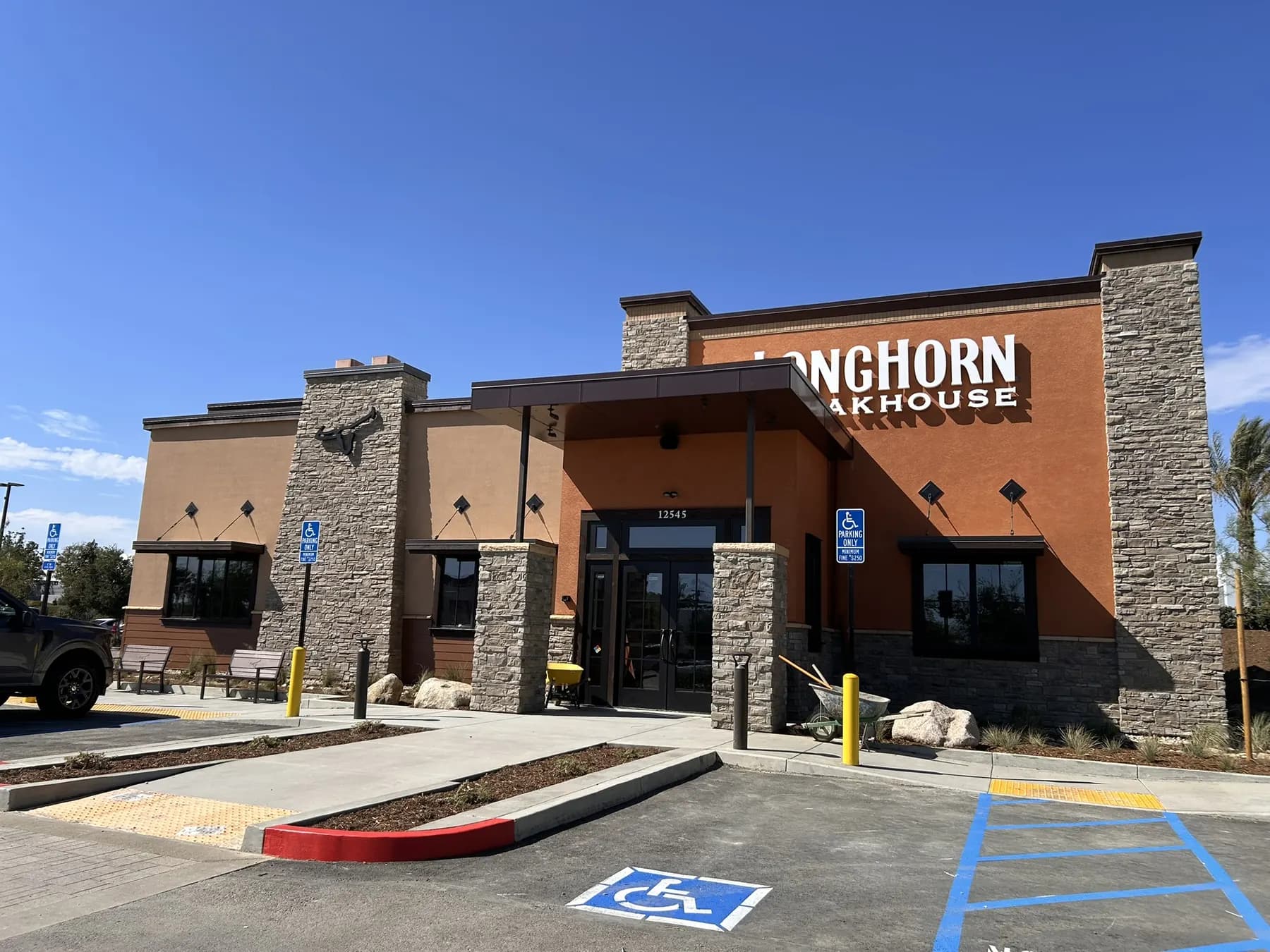 Stone veneer entrance columns on a LongHorn Steakhouse building exterior